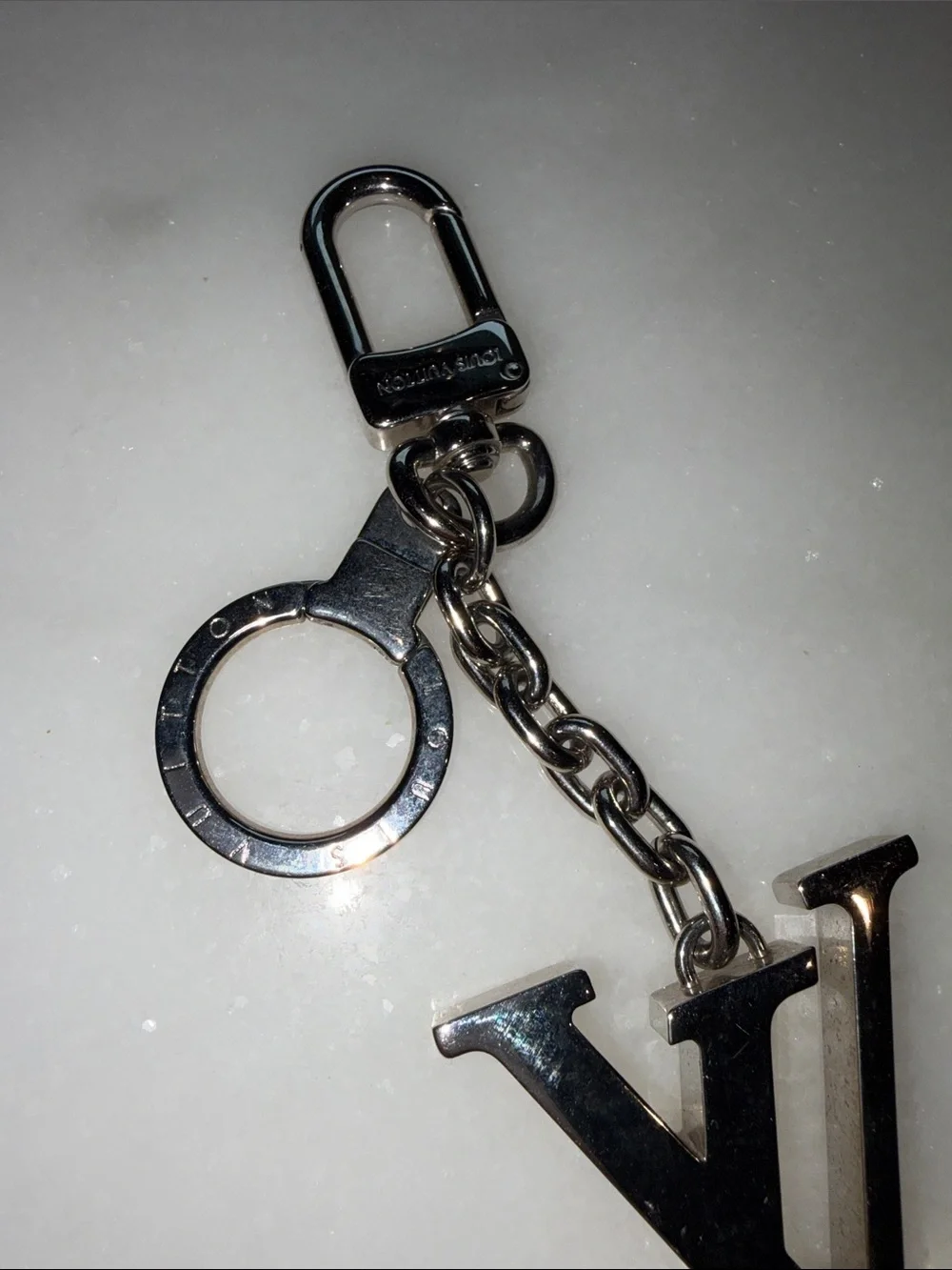 Louis Vuitton Silver LV Logo Keyring